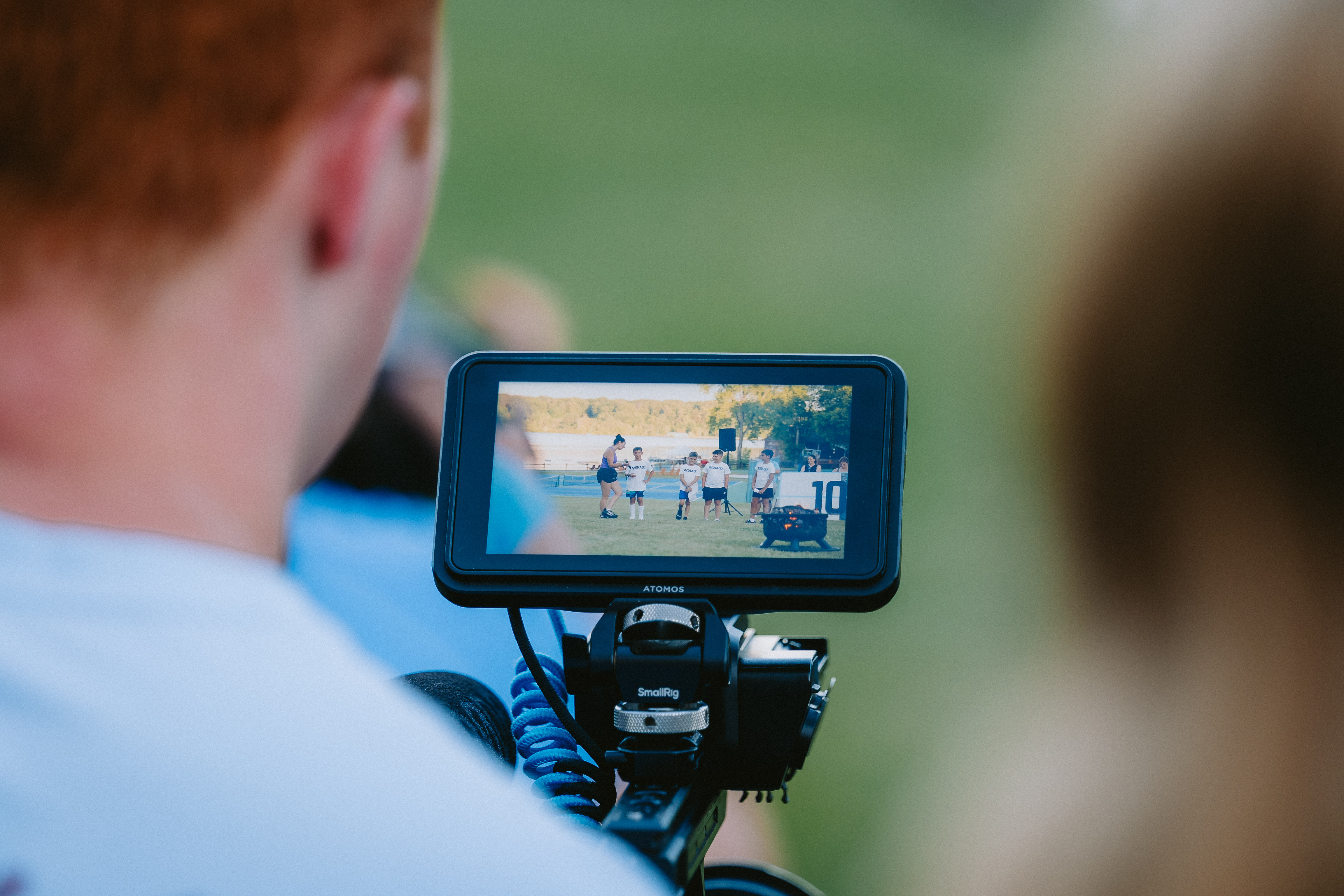 Camp Winadu video camera filming a camp activity