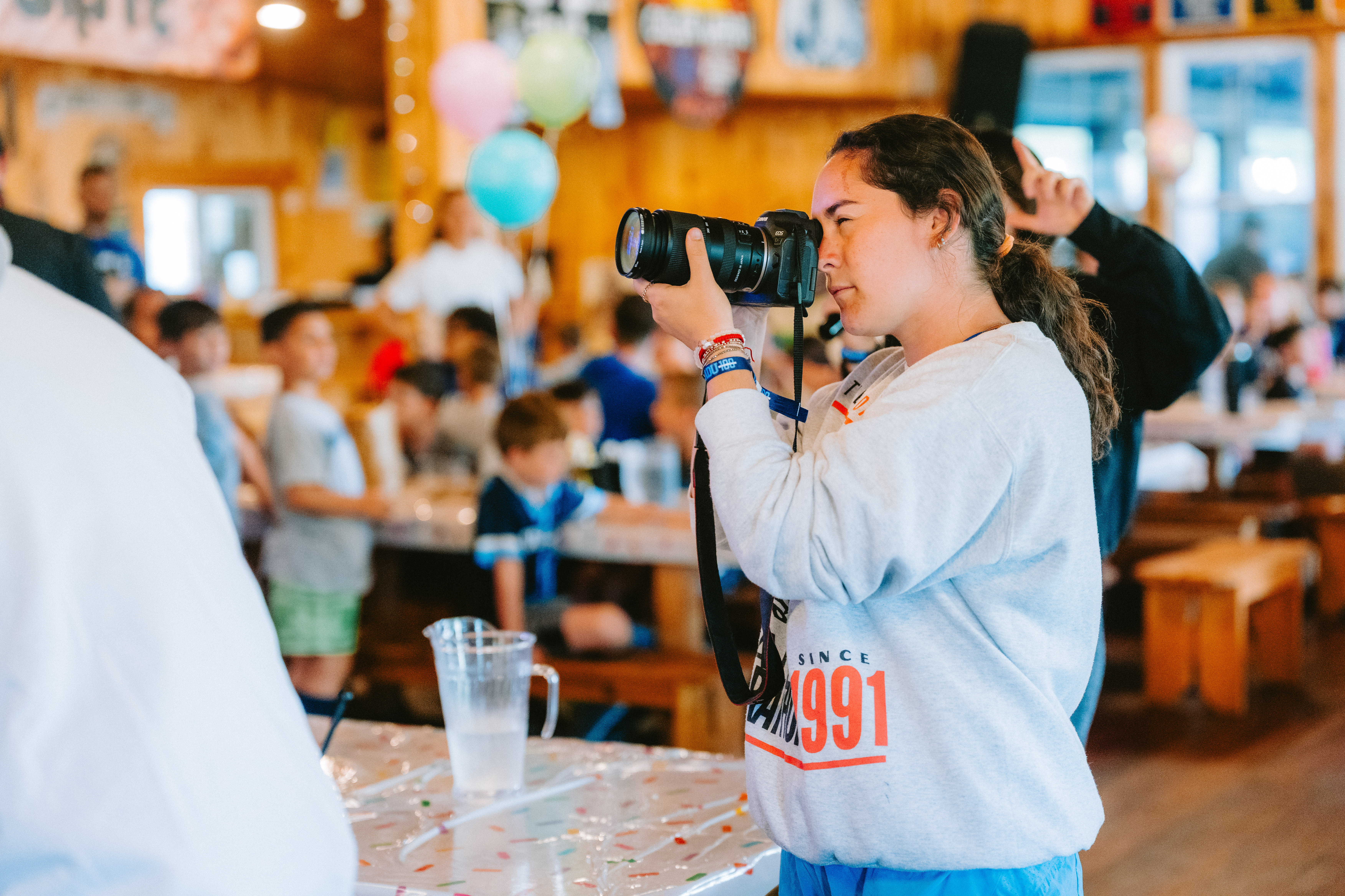 Camp Winadu Media Team photographer capturing a camp event
