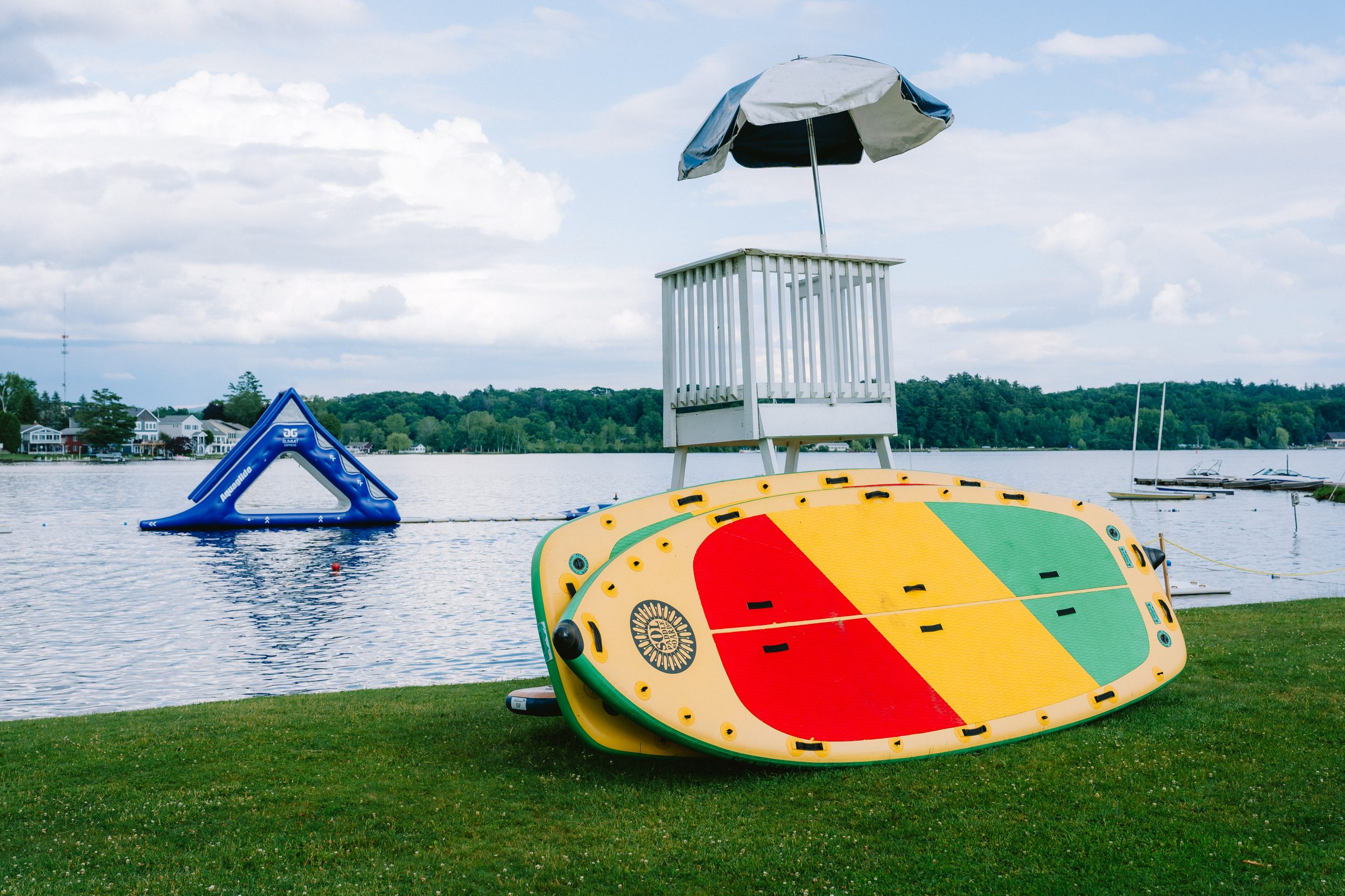 Camp Winadu lifeguard stand and paddleboards at the lake